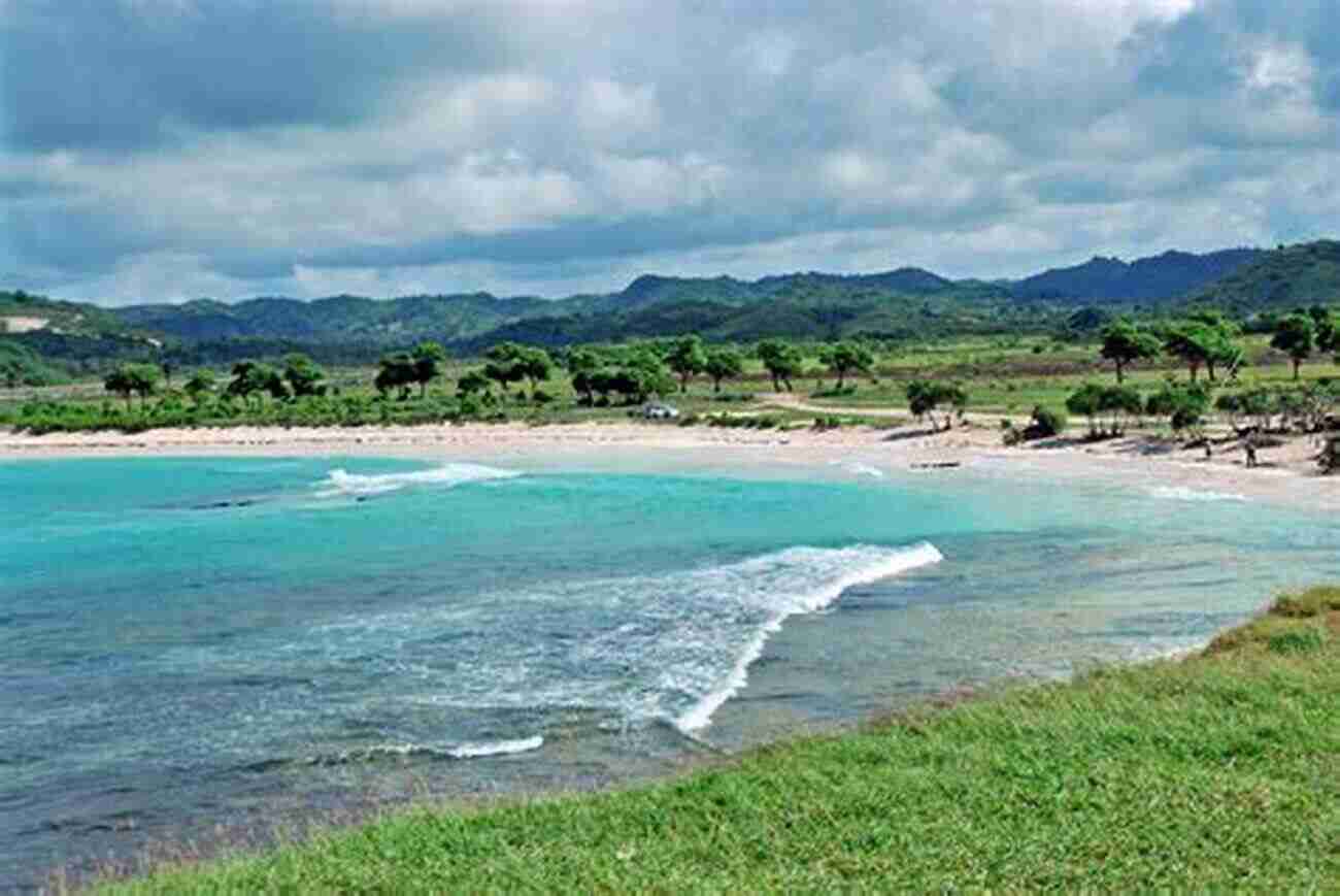 A Secluded Beach In Lombok, Surrounded By Lush Hills A Portrait Of Bali And Lombok