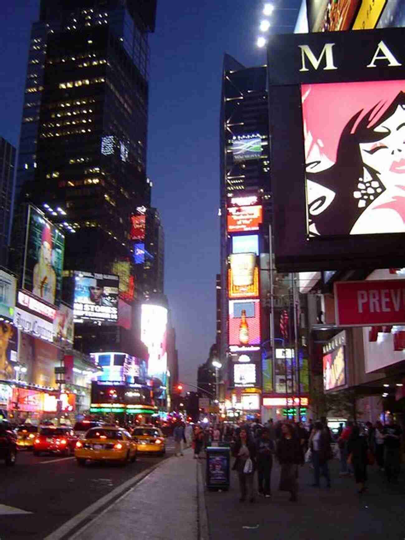 A Vibrant And Bustling Scene Of Times Square In New York City At Night Inside The Apple: A Streetwise History Of New York City