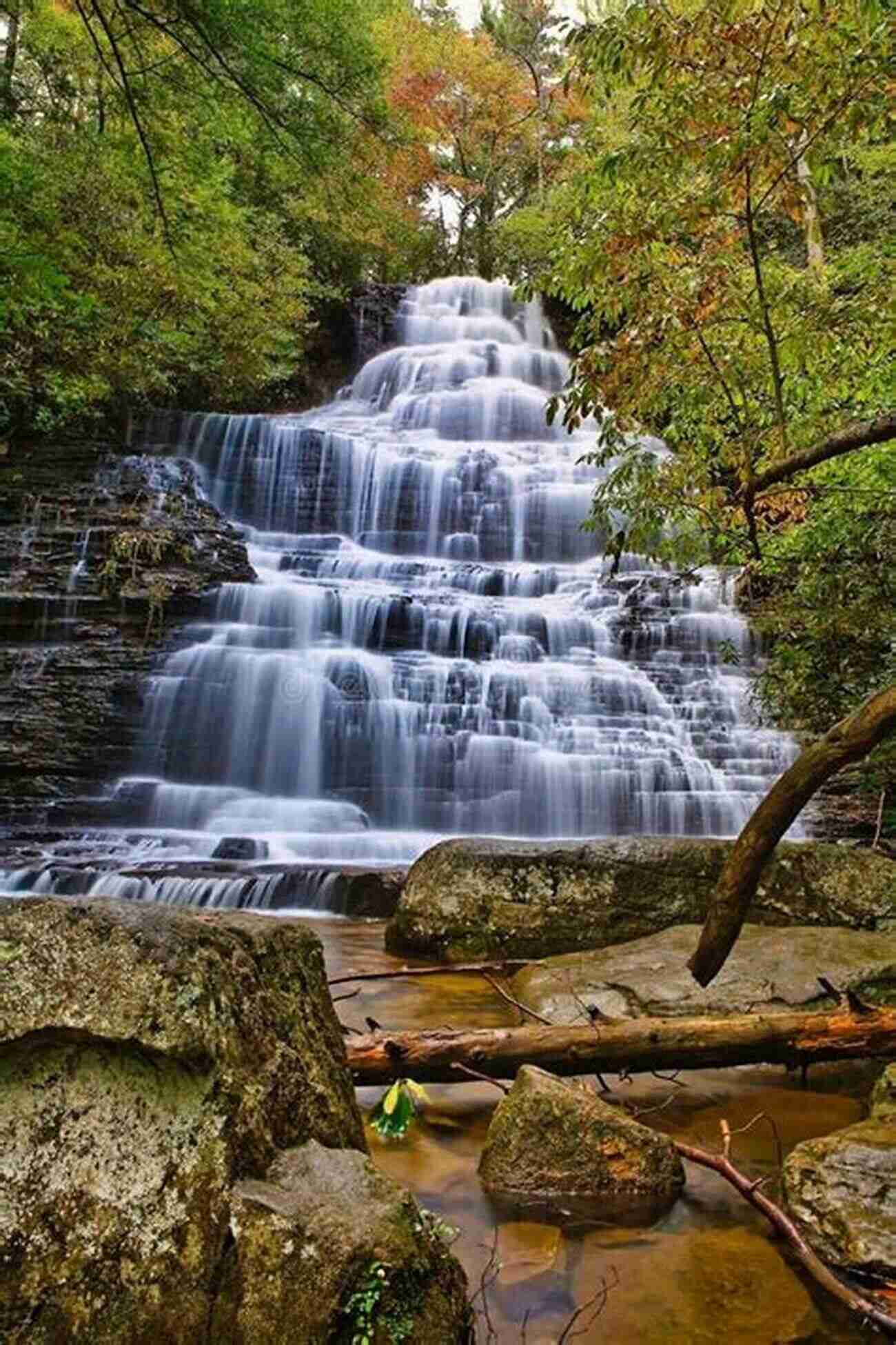 Majestic Waterfall Cascading Down Rocks, Surrounded By A Lush Landscape Mother Earth S Beauty: Types Of Air Around Us (For Early Learners): Nature For Kids Earth Sciences (Children S Weather Books)