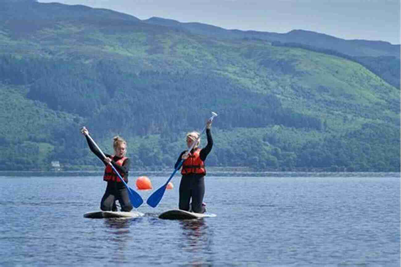 Paddleboarding On Loch Lomond Stand Up Paddleboarding In Great Britain: Beautiful Places To Paddleboard In England Scotland Wales